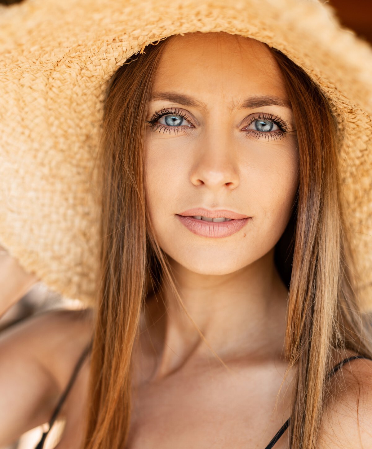 Los Angeles Dermal fillers model wearing a hat