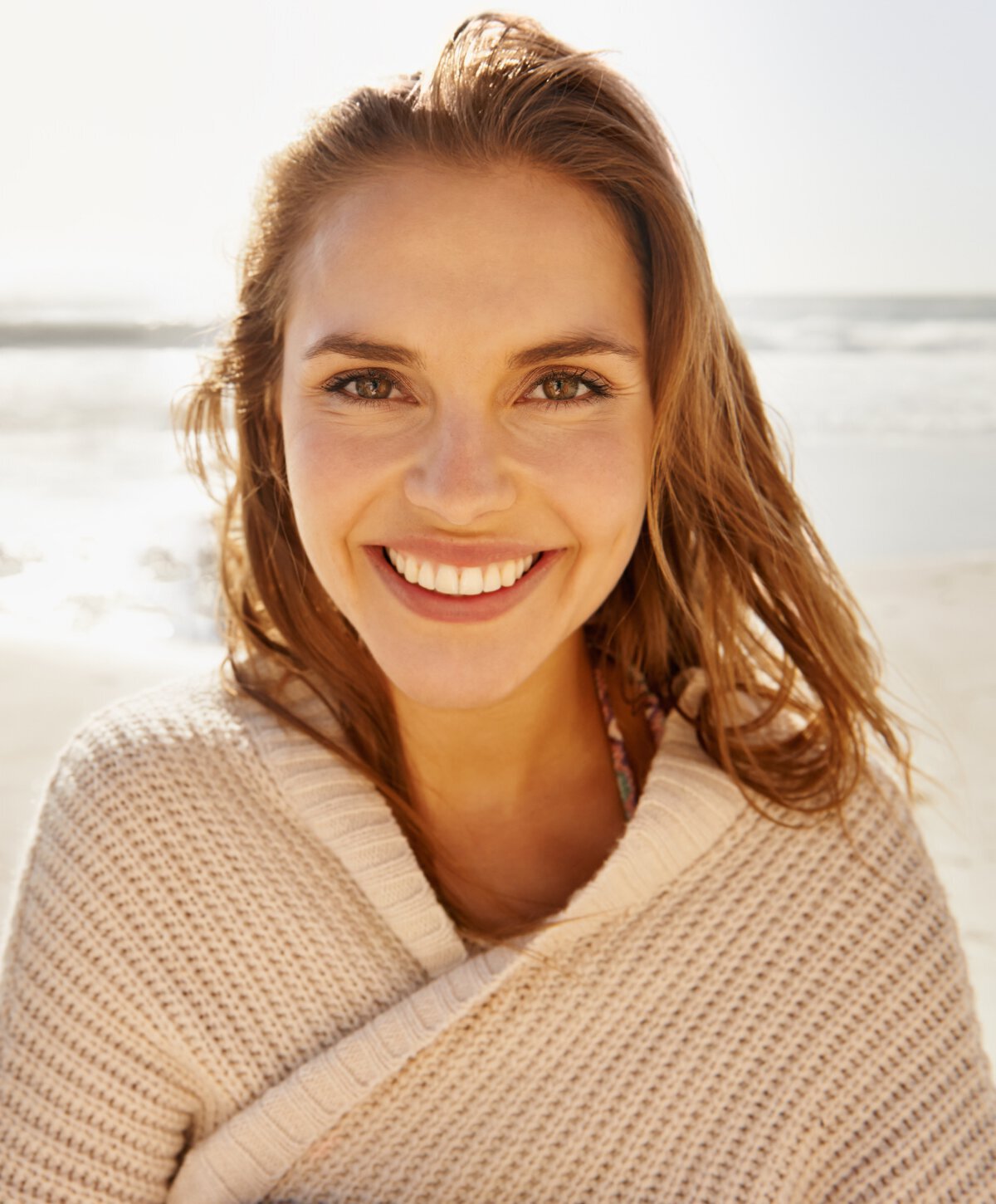 Smiling woman on beach