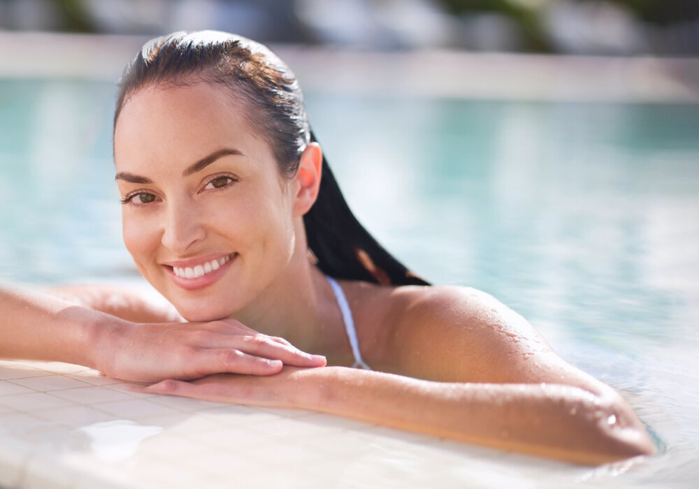 HydraFacial - Smiling woman in pool